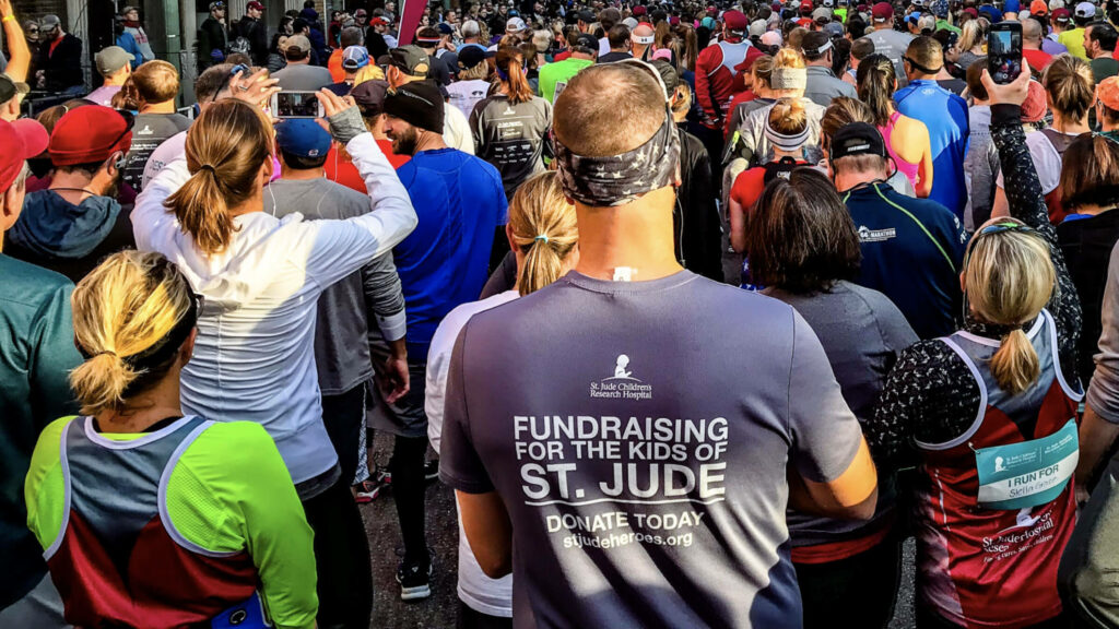 Crowd of runners waiting for a charity marathon to begin